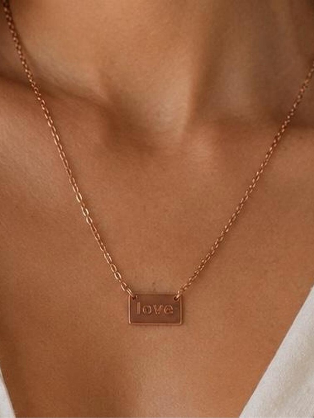 Timeless Elegance: The "Love" Bar Necklace